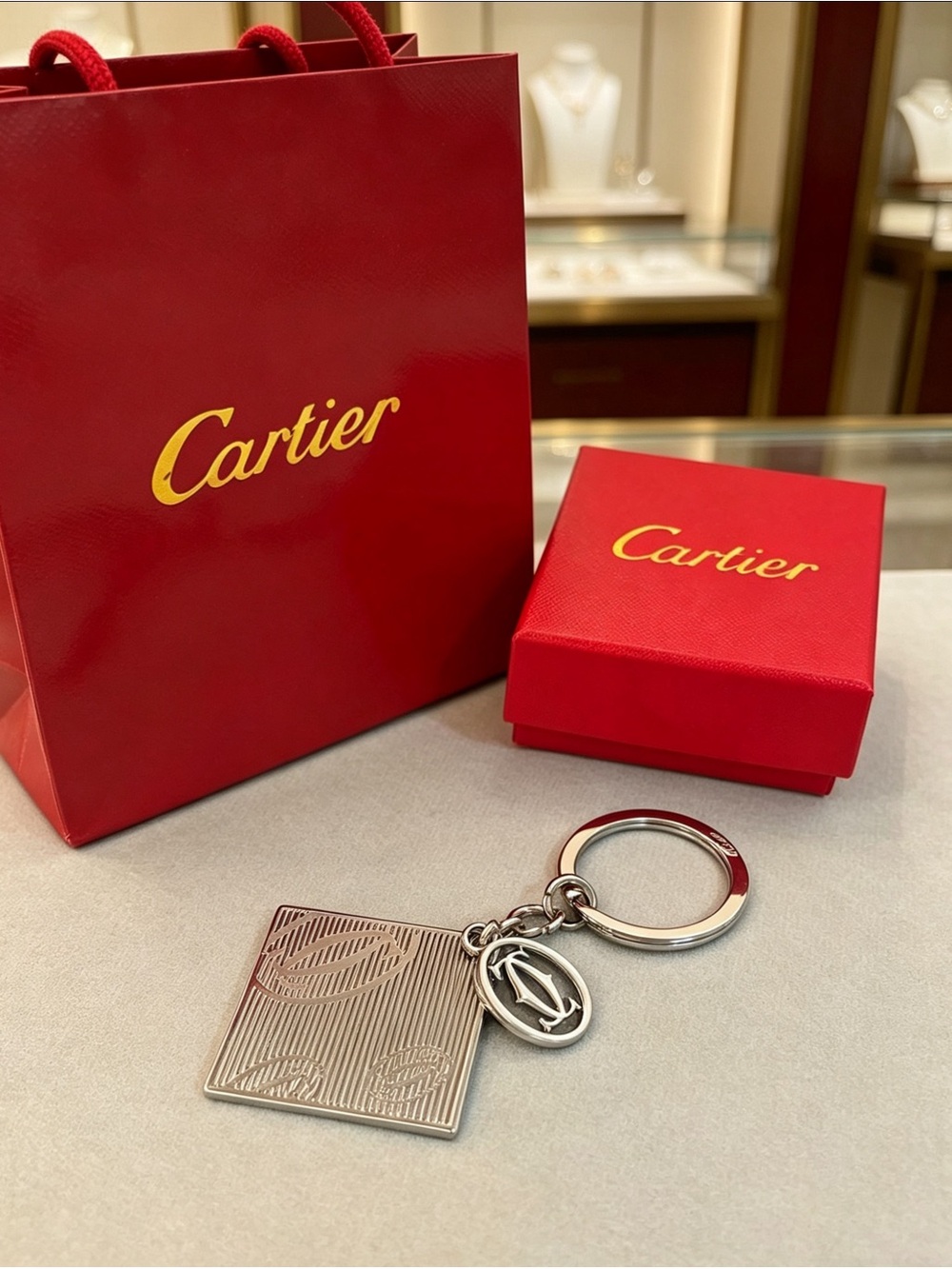 Cartier Silver-Tone Keyring with Red Cartier Box